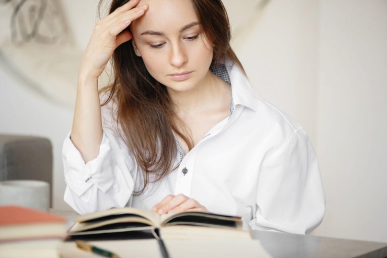 an image of a woman overthinking and ruminating